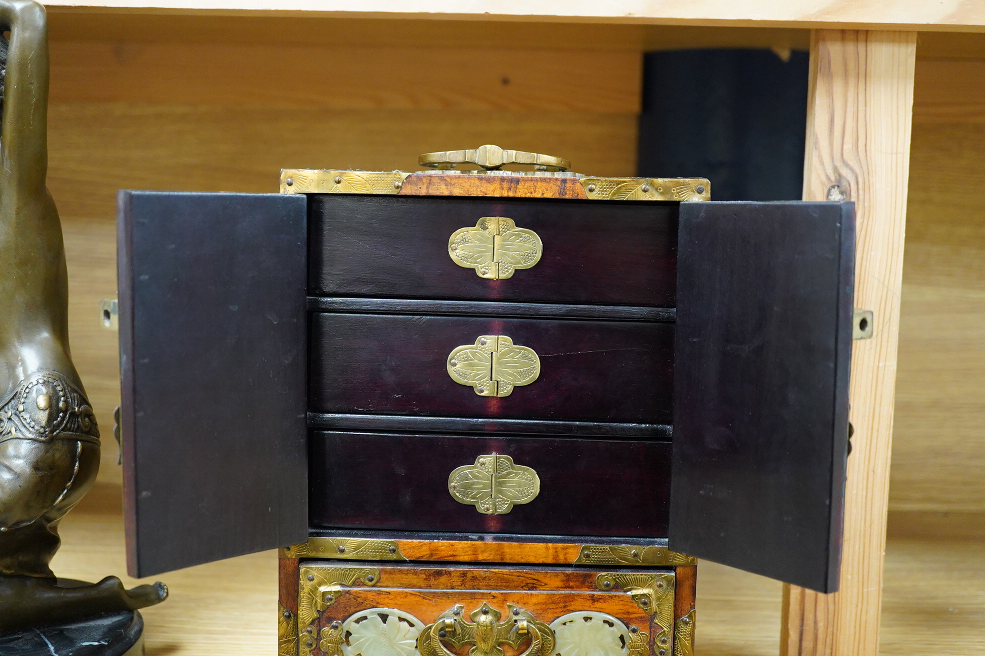 A Chinese walnut jewellery box with carved bowenite jade panels, 24.5cm high
